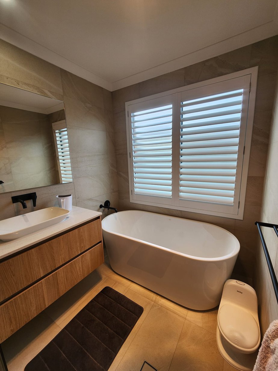 bathroom window Plantation shutters installed in Alkimos, WA, Australia.
