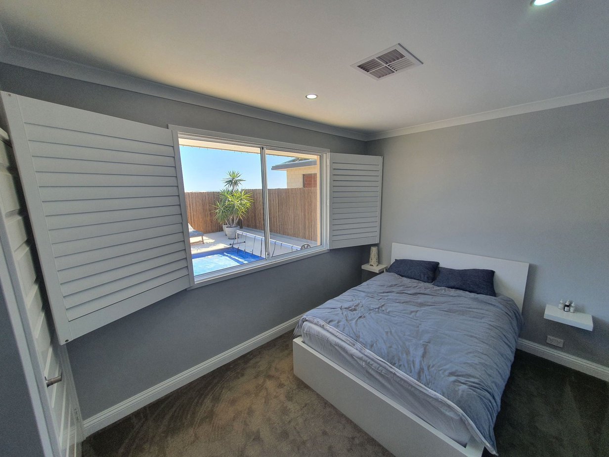 window shutters in bedroom